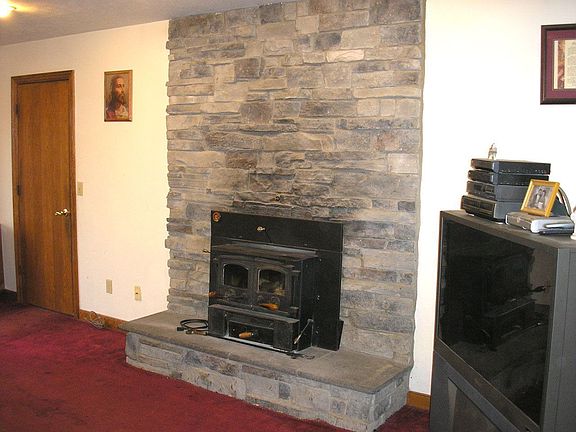 Family room with 2nd fireplace and sliding doors to back yard