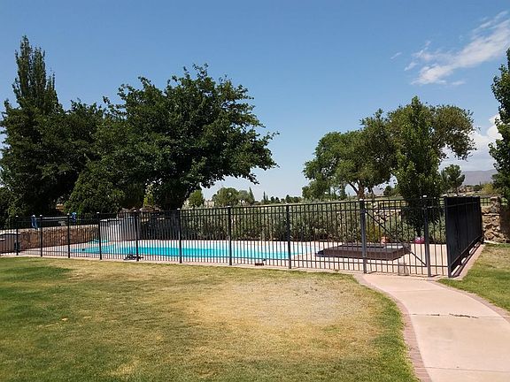 Walk out to your green yard & pool