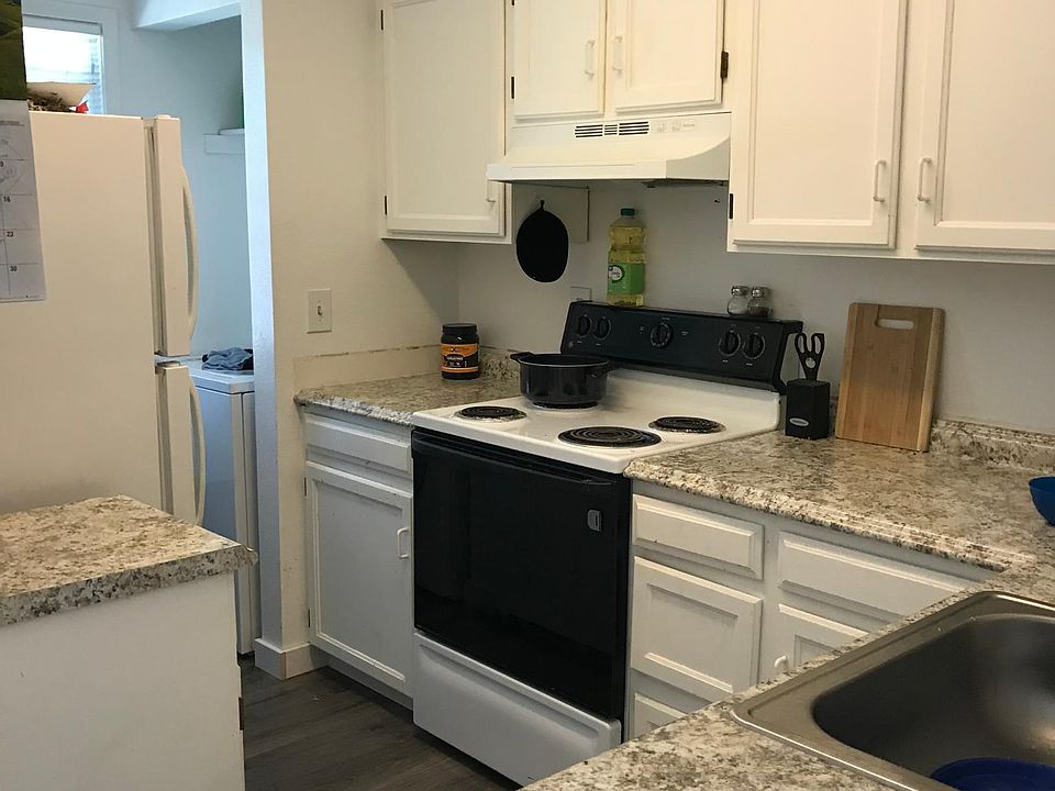 Kitchen with granite counters.