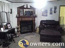 Family room with wood burning fireplace