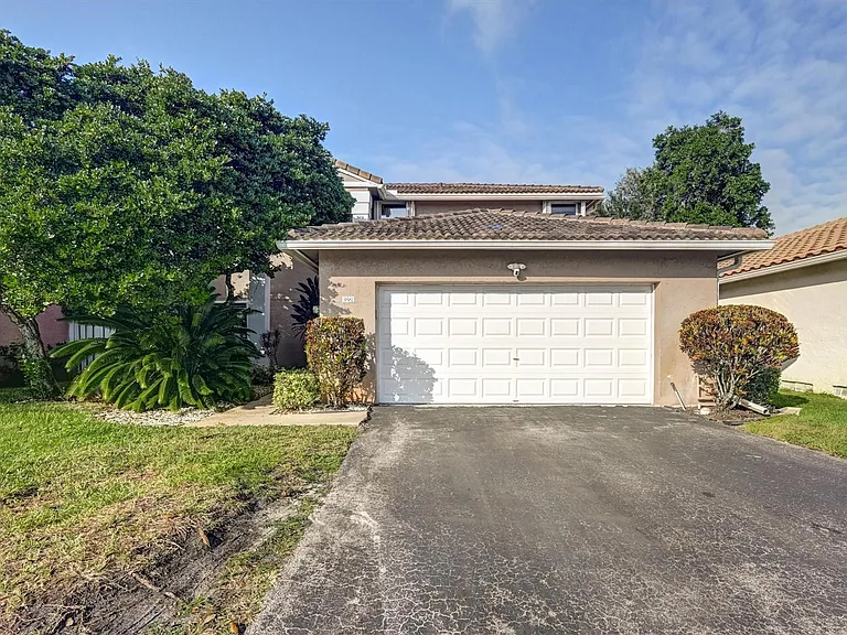 9581 NW 9th Ct — Photo 41