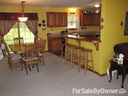Dining Room
						:
						Open floor plan from living room allows airy feel as you enter the home.
