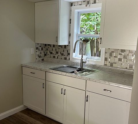 new kitchen with kitchen sink work station