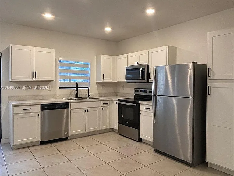 105 NE 3rd Ct — Photo 3
