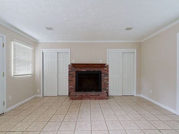 Den w/ Wetbar & Fireplace