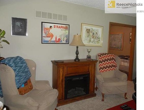 formal living room with new carpeting