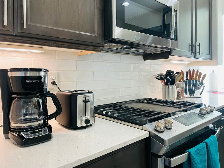 Coffee maker, toaster, utensils are all provided in your fully-furnished dream kitchen.