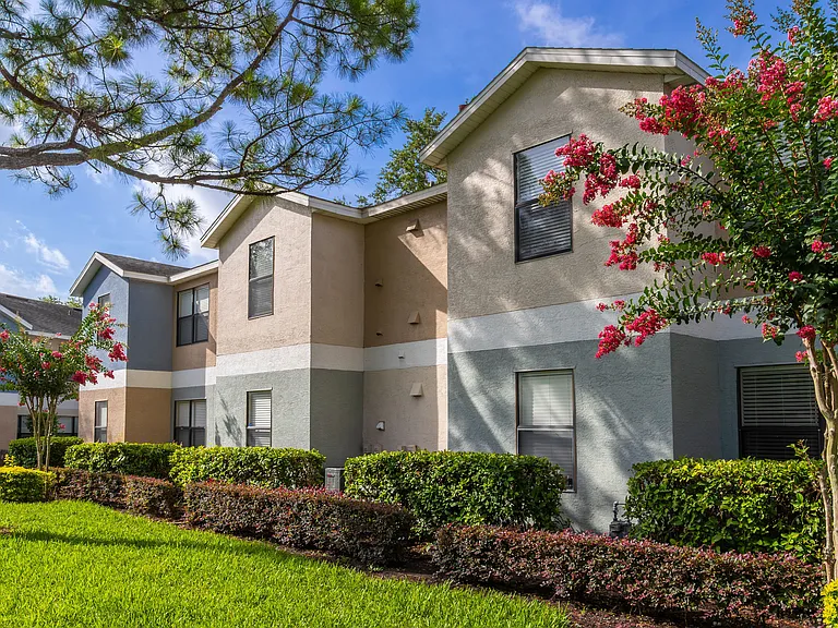 Enjoy the lush landscaping and charming curb appeal of Harper Grand Apartments in Orlando, FL. Our garden-style homes offer peaceful views and a welcoming atmosphere.