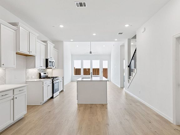 Kitchen in the Hanna Floorplan at Midtown GP in Grand Prairie, TX.