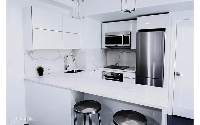 Sold by Douglas Elliman | media 12