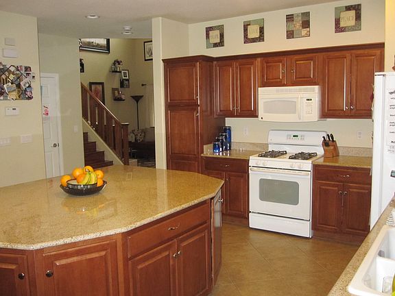Kitchen with LARGE granite island/counters
