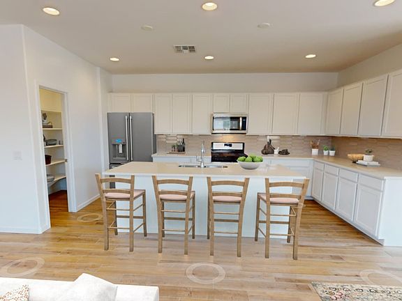 Virtually staged kitchen in a Clover home.