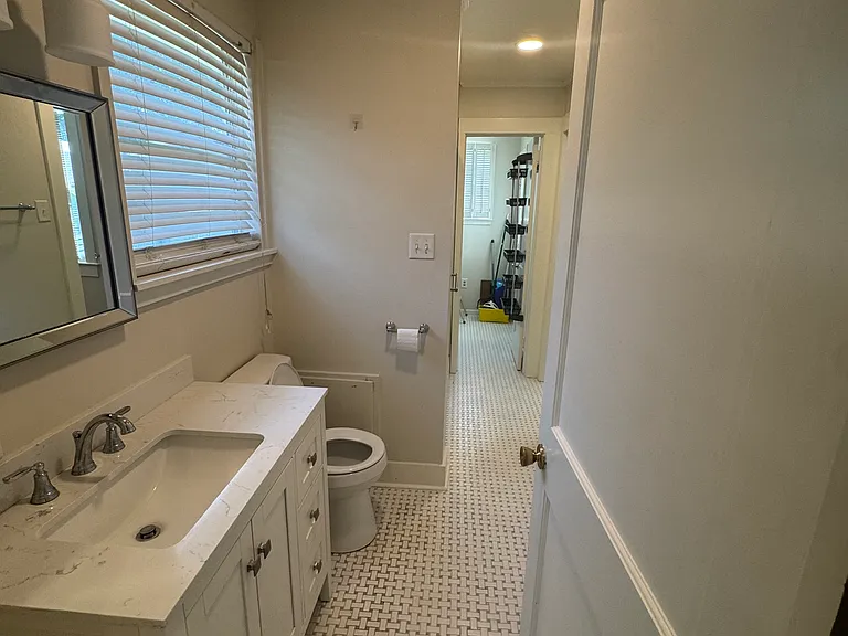 View of the new vanity and walk-in shower. This is between bedroom 1 and 2