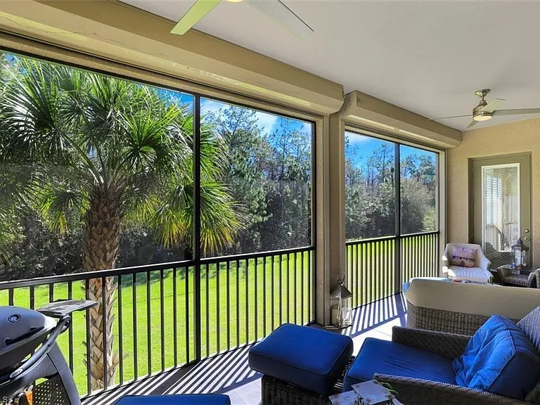 East facing screened in lanai overlooks the pristine preserves. Enjoy your morning coffee or unwind in the evening with your favorite drink.