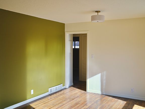 Front room -- large picture windows and abundant light