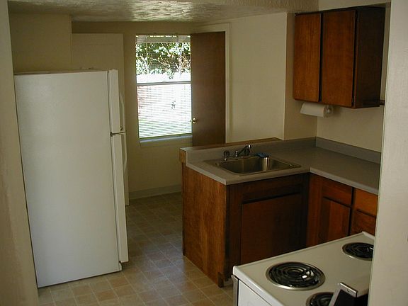 Kitchen with Range, Refrigerator and Pantry