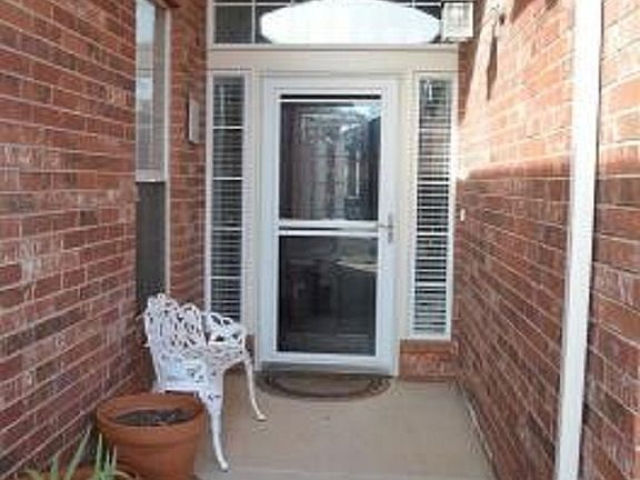 Welcoming front entry withstorm door