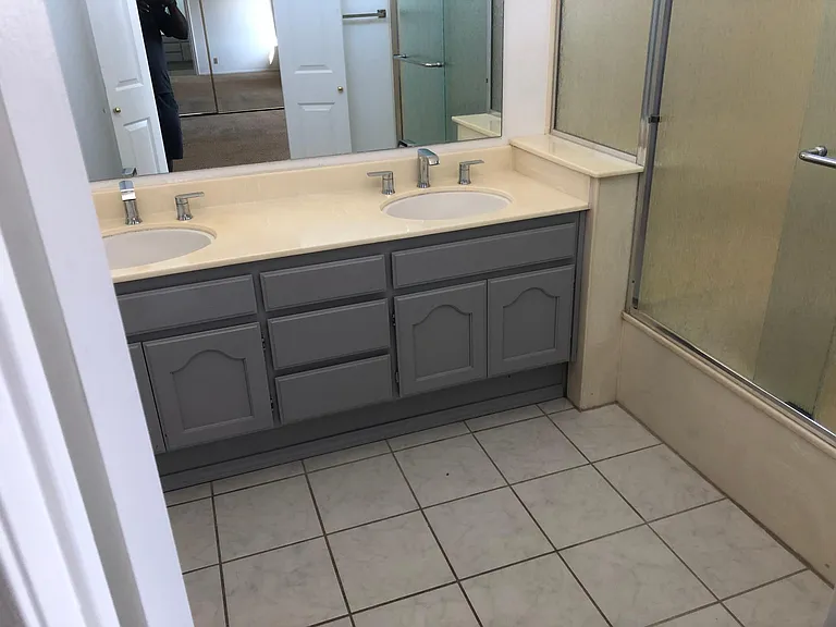 Master Bathroom with new shower doors,mirrors and new ventilation fan