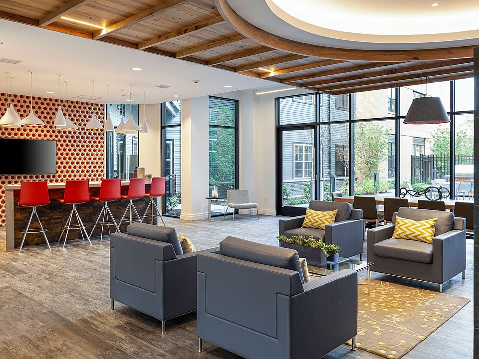 The Entertainment Lounge features bar seating and large-screen TV