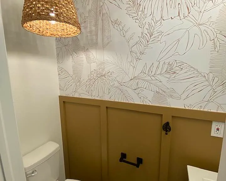 Brand New Half Bath with custom trimwork & wallpaper