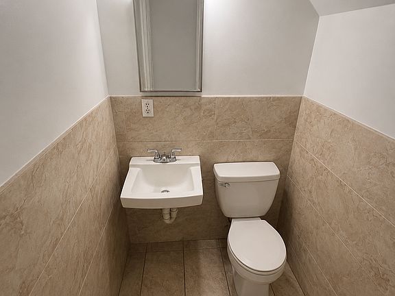 Clean, well-maintained shared bathroom conveniently located just across the hall from the bedroom.