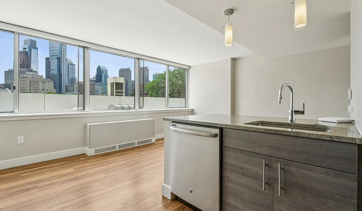 Studio floor plan features an open concept layout with a spacious living area - Park Towne Place