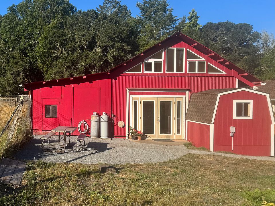 Front courtyard and entrance, storage area door on left