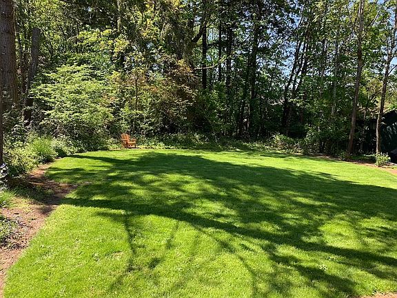 1/2 acre yard with landscape maintenance included