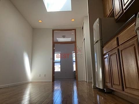 5th image of 308 E 6th St APT 13