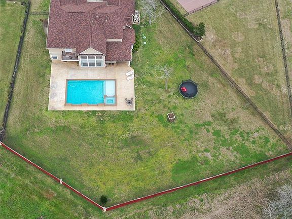 Wonderful backyard with gunite pool, stone fire pit, and cool decking! Lots of room for playground equipment also!!