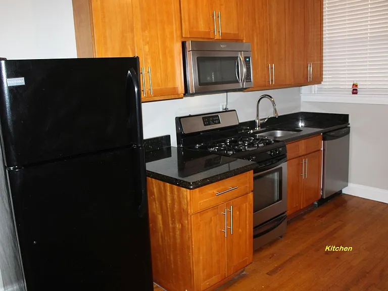 The fridge has been replaced with a stainless-steel fridge