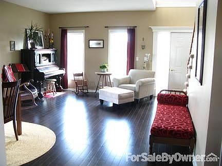Living Room : Bamboo hardwood flooring and large, bright windows.