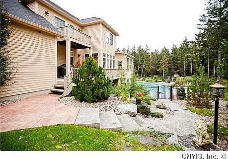 Side Exterior w/ beautiful landscping