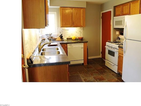 Owners gutted the kitchen and reworked it into an attractive, functional space.