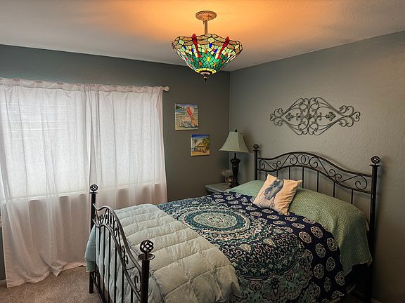 Queen size bed with new bedding