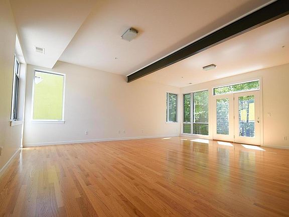 Spacious living room with tons of natural light