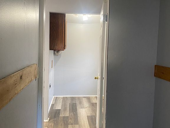 View into mudroom and laundry room from side door