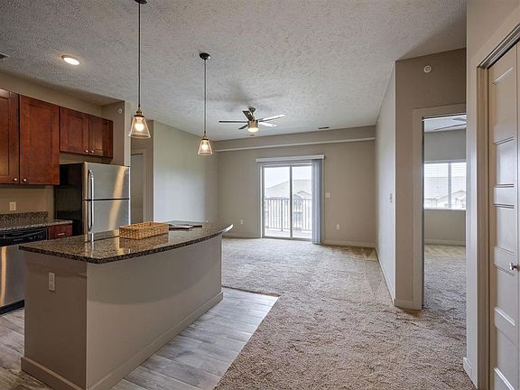 Unit kitceh and living room at Avenue 204.