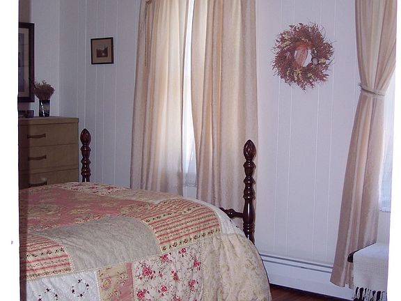 one of three bedrooms