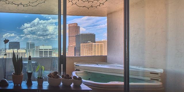 Your own private hot tub and a view of downtown Denver from on-top of it!