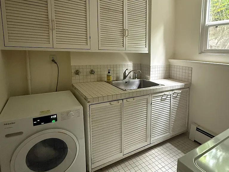 Laundry room, shared access with downstairs unit