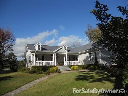 Front Entry
						:
						Large front porch with stone printed walkway that leads to the 2 car garage.