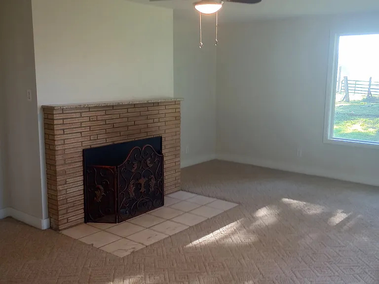 Lopi wood stove and neutral berber carpet