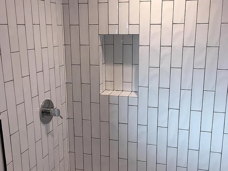 Brand new fixtures and subway tiles