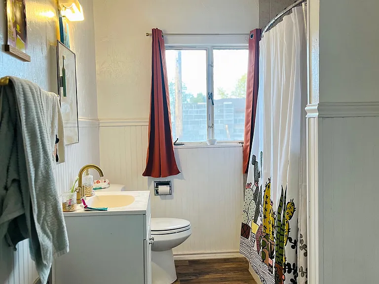 Huge bathroom, there is a space for storage to the right (not pictured), plus a closet with built in shelves for all bathroom supplies.