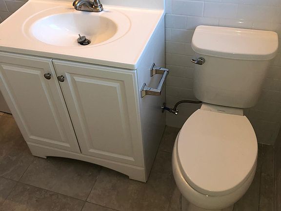 New Bath Vanity, Toilet and Tile