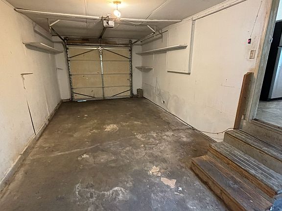 garage for covered parking with garage door opener