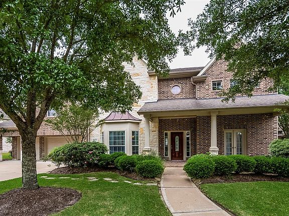 Upgraded Elevation with All Stone and Brick Exterior, 3 Car Garage, 5051 SF, 5 bedrooms, 4.5 Baths, Game Room and Huge Bonus Room.
