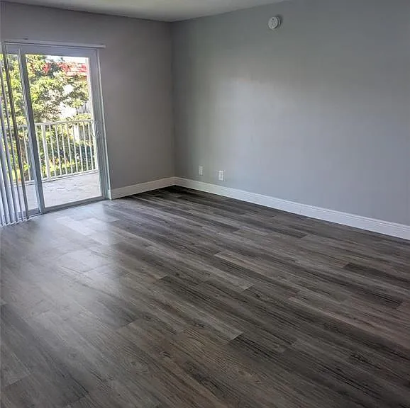 5861 NW 16th Pl #307 — Photo 1