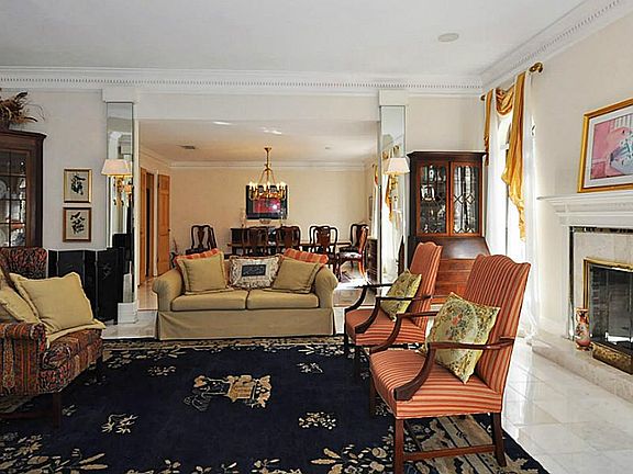 TILED GASLOG FIREPLACE IN FORMAL LIVING